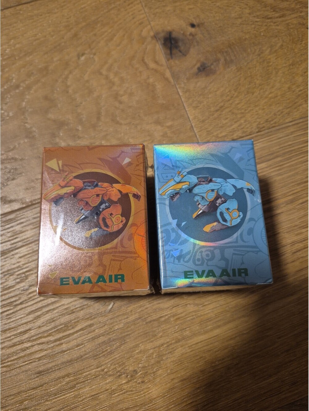 LOT (X2) EVA AIR AIRLINES DINOSAUR EGG TRANSFORMER TOY NEW Blue Orange